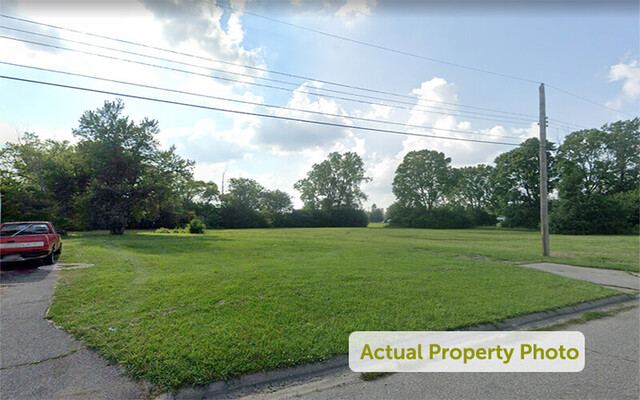 Cleared Residential Parcel with Driveway and Sidewalk – 0.31 Acres in Flint, Michigan